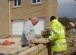 Adding the coping stones to the boundary wall