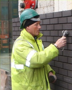 David doing a bricklaying job in Sheffield city center