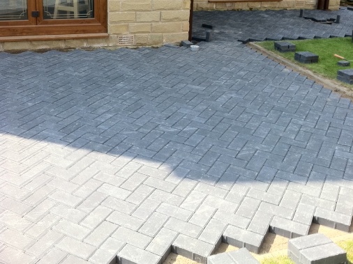 Patio area approximately 30msq laid using 50mm pacers